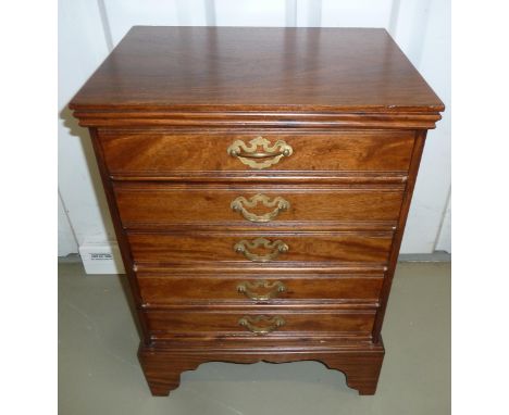 An Edwardian rectangular mahogany five drawer music cabinet with brass swing handles on bracket feet, 62 x 44 x 33cm