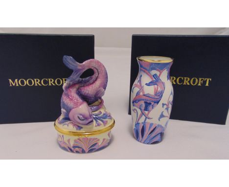 Moorcroft enamel covered box decorated with fish and flowers, 9.5cm (h) and a miniature matching vase 9cm (h) to include orig