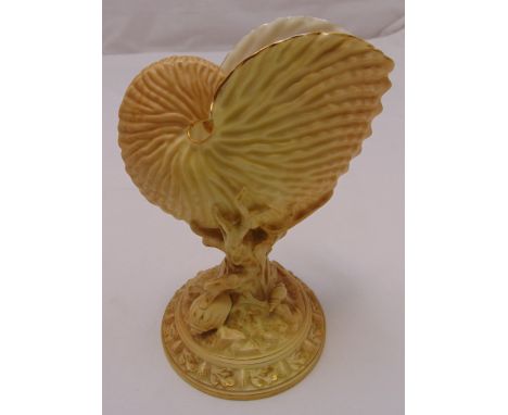Royal Worcester blush yellow shell centrepiece, featuring a Nautilus chamber shell on coral stems with crustaceans as decorat