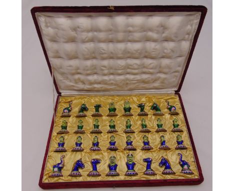 An Indian white metal and polychromatic enamel chess set in original fitted case