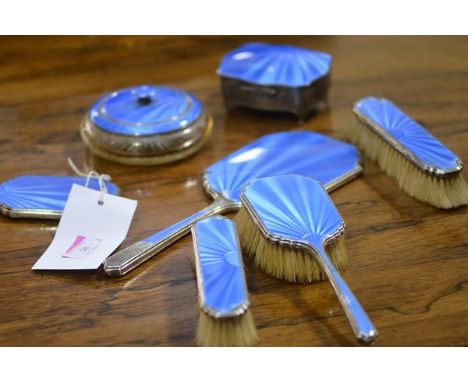 A matched set of George V silver and sky blue enamel dressing table articles, various years including 1928 and 1933, retailer