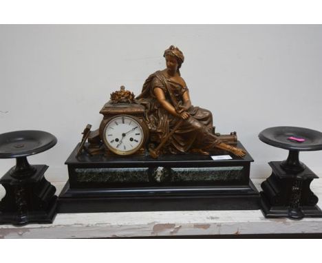 A 19th century gilt-metal mounted slate and marble clock garniture, late 19th century, the drumhead clock by the seated Figur