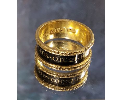 A George IV 18ct mourning ring, a 8mm wide the gold band with recessed black enamel centre with lettering "Ann Scarr OB 21 DE