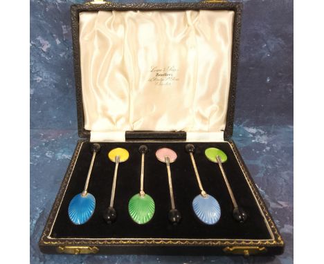 A set of six Elizabeth II silver and guilloche enamel coffee spoons,&nbsp; the backs in green, blue, pink, yellow and blue, H