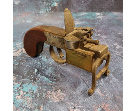 A Dunhill flintlock 'Tinder pistol' lighter, stamped 'Dunhill tinder pistol, made in England, PAT. 19273/34, Regd No 794093, 
