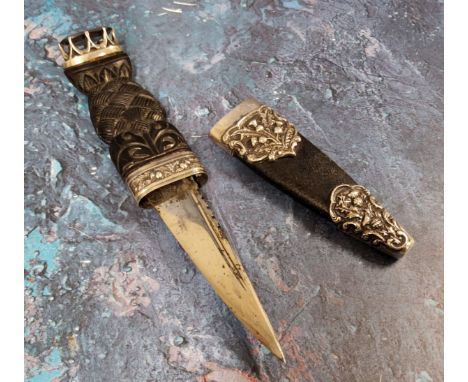 A Scottish silver mounted Sgian Dabh dagger,&nbsp;7cm stainless steel blade, carved horn knotted hilt, set with a&nbsp; paste