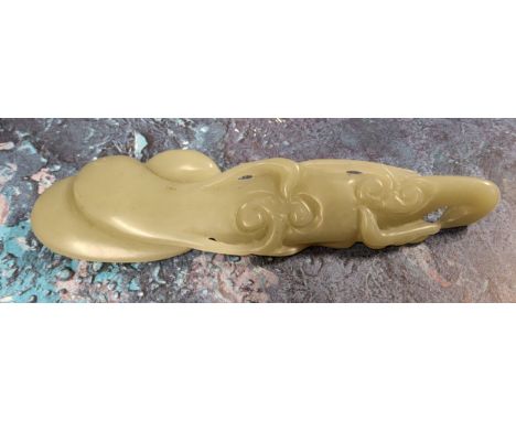 A Chinese celedon jade carving/wrist rest, 14cm wide 