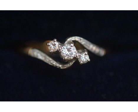 18ct Gold ring set with 3 diamonds. Size M