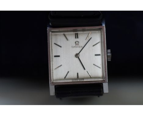1963 Omega wristwatch manual wind movement, currently ticking but not tested for time accuracy. Original omega crown, strap &