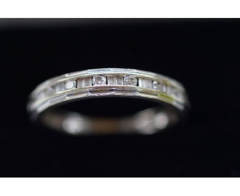 9ct Gold half eternity ring set with 16 diamonds, 8 round cut &amp; 8 Baggett diamonds Size M 