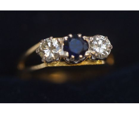 18ct Yellow gold ring set with two good quality diamonds &amp; central deep blue sapphire. Size N