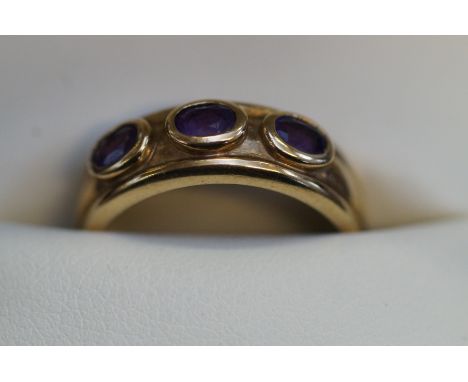 9ct Gold ring set with 3 amethyst Size K 