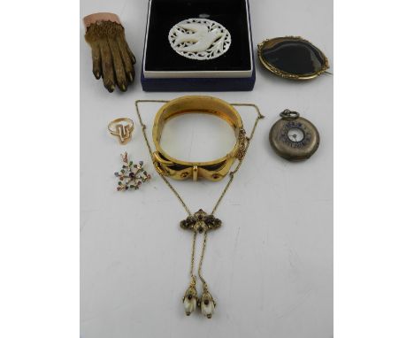 A quantity of jewellery, to include a Victorian yellow metal mounted taxidermy otter's paw brooch, together with a Victorian 