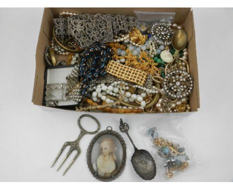 An assortment of costume jewellery and other items, to include a portrait miniature, a carnelian brooch, a white metal belt, 