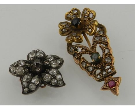 A late 19th / early 20th century white metal and diamond set flower, possibly from a brooch, together with a yellow metal, di