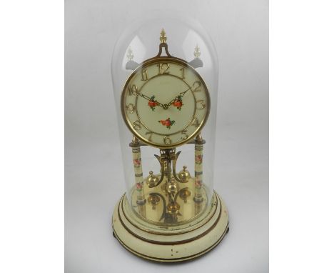 A German skeleton clock by German Kieninger & Obergfell Kundo, cream painted dial and supports with floral decoration, suppor