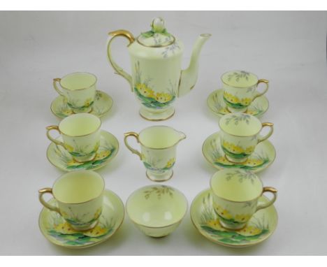 A Crown Staffordshire hand-painted Art Deco tea service, including a teapot, together with a Blyth Porcelain Co. Art Deco 'Di