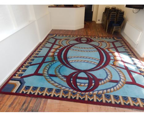 An Art Deco-style turquoise ground lobby carpet, L: 438 W: 438cm