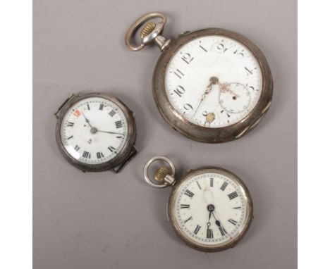 A silver pocket watch with enamel dial, a silver fob watch and a silver cased wristwatch with wire lugs, for spares and repai