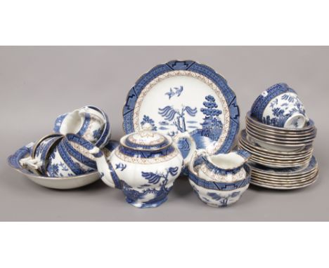A Booths Real Old Willow six place tea service with teapot, along with matching fruit dishes etc, 31 pieces.