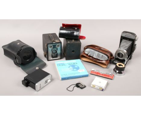 A quantity of photograph equipment including a Solida 1 120 film camera, Kodak six 20 Bellows, Nikon lens keeper etc.