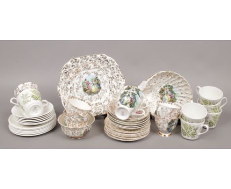 An English bone china six place tea service decorated with figures, along with a Queen Anne six place set and Daybrook cod bo