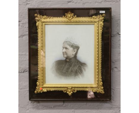 A Victorian portrait on opaque glass in fine gilt frame and cased.