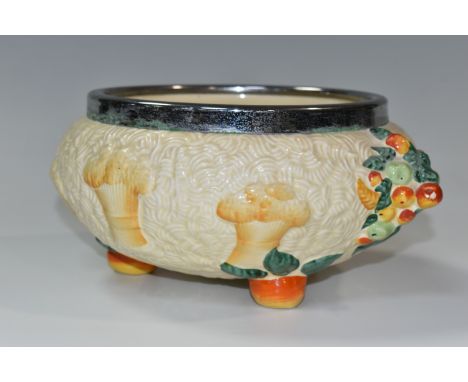 A CLARICE CLIFF 'CELTIC HARVEST' FRUIT BOWL, moulded and painted with fruits and wheatsheaves on a textured cream ground, pla