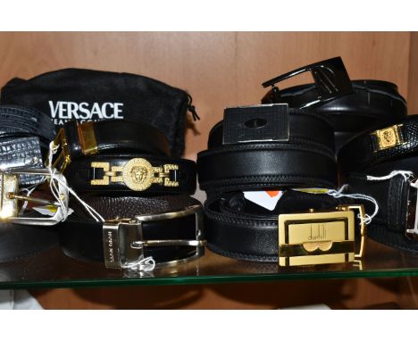 A GROUP OF NINE GENTLEMENS DESIGNER LEATHER BELTS, black belts comprising maker's names Hugo Boss, Dunhill, YSL, a brown leat