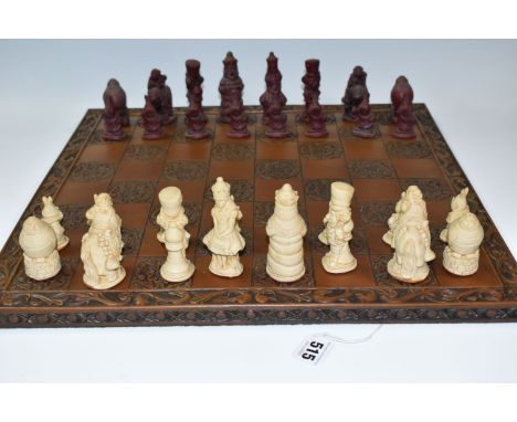 AN ALICE IN WONDERLAND CHESS BOARD AND SET OF THIRTY TWO CHESS PIECES IN RED AND WHITE, comprising  a resin board with a Tudo
