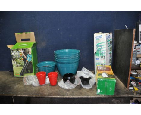 A COLLECTION OF GARDEN EQUIPMENT including a Tesco garden blower (still packaged and unused), manual sprayer, five 37cm diame