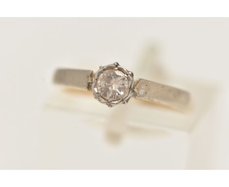 A DIAMOND SINGLE STONE RING, round brilliant cut diamond, in a white metal illusion claw setting, estimated diamond weight 0.