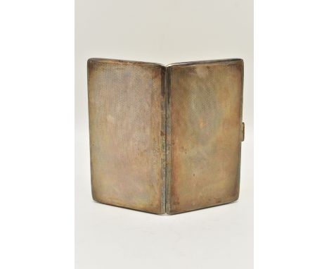 A SILVER CIGARETTE CASE, of a rectangular form with engine turned pattern, push button clasp, gilt interior fitted with a yel