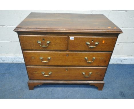 A GEORGIAN OAK CHEST OF TWO SHORT OVER TWO LONG DRAWERS, raised on bracket feet, width 92cm x depth 53cm x height 80cm (condi
