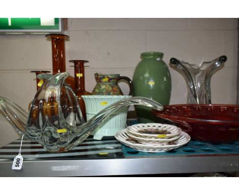 A GROUP OF ORNAMENTAL GLASSWARE to include three  amber vases (heights 26cm, 31cm, and 45cm),  a C.H Brannam green glazed vas