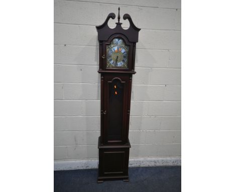 A MODERN MAHOGANY EFFECT LONGCASE CLOCK, with twin swan neck pediment, a single finial, the arched door enclosing a brass and