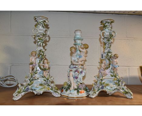 A PAIR OF DRESDEN STYLE PORCELAIN FIGURAL CANDLE STICKS AND ONE OTHER, comprising a pair of Dresden style candle sticks with 