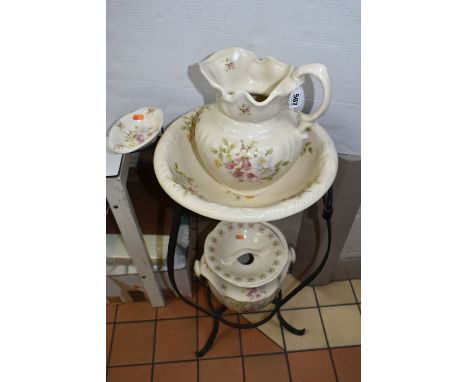 A MODERN REPRODUCTION OF AN EARLY CERAMIC WASH STAND to include a wash basin and water jug, a soap dish, a French style chamb