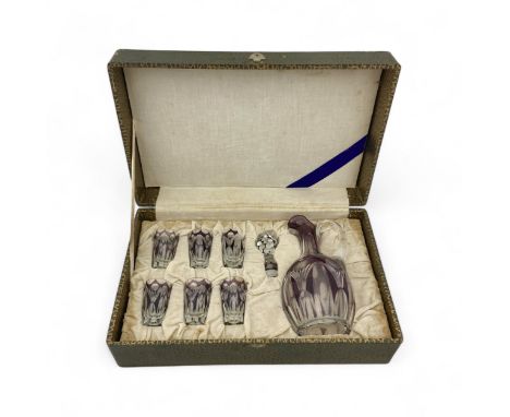A 1930s Belgian Val St Lambert liqueur stoppered jug and set of six shot glasses set, the bodies flashed in purple and cut th