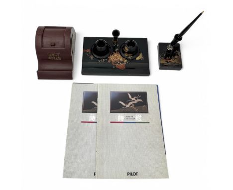 A group of items relating to Pilot, Japanese lacquer and Dunhill, comprising a early to mid-20thC deskbase lacquered with a s