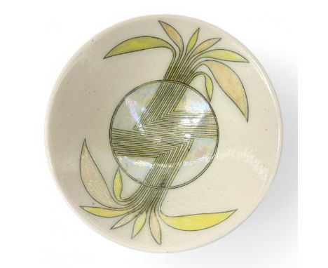 A Laurel Keeley (British, b.1952) contemporary studio pottery footed bowl, the interior decorated in green and pinky-orange l