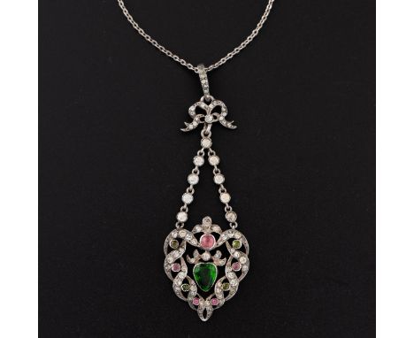 An Edwardian white metal chain and pendant necklace (possibly of Suffragette interest), a heart-shape form constructed from t