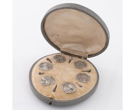 A boxed set of Art Nouveau sterling silver buttons by Levi & Salaman, Birmingham 1904, with contoured rim and feature and wit
