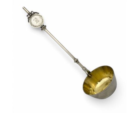 A late 19thC American Gorham Manufacturing Company sterling silver soup or punch ladle, with modelled hand grasping the angul