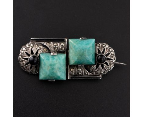 An Art Deco white metal and amazonite brooch by Theodore Fahrner (Germany 1859-1919), c.1910, with black onyx and enamel, the