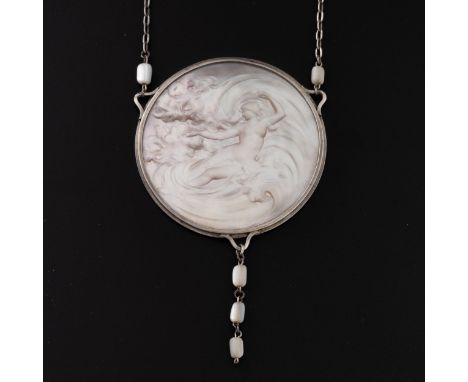 An unmarked white metal and mother of pearl pendant necklace by Paul Grandhomme (French, 1851-1944), c.1900, the large carved