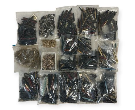 A very large lot of many hundreds of early to late 20thC vintage pen parts and part pens, including barrels and caps in black