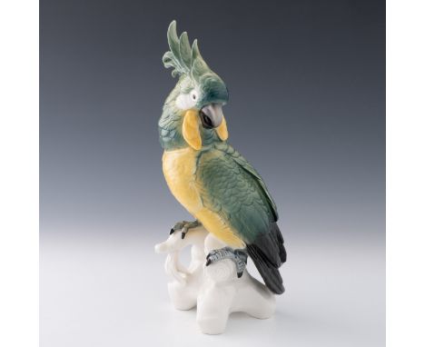 A German Volkstedt porcelain cockatoo figure by Karl Ens, c.1930s, designed by Karl Ens, bears green windmill mark and model 