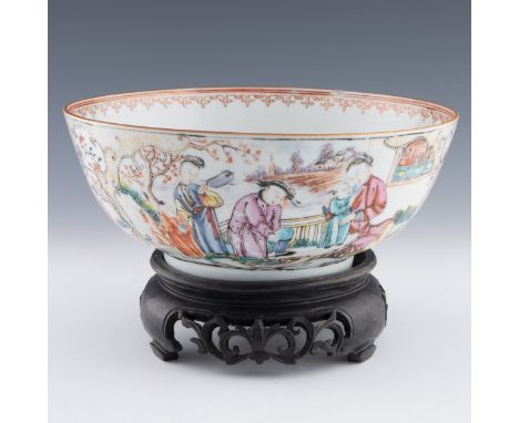 A late 18thC Chinese Qianlong period famille rose porcelaion bowl, decorated in polychrome with older and younger people enga