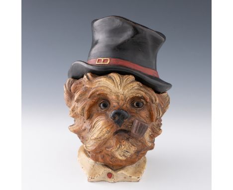 A terrier dog terracotta pottery tobacco jar attributed to Johan Marash c.1890, the dog smoking a pipe and wearing a tatty ha